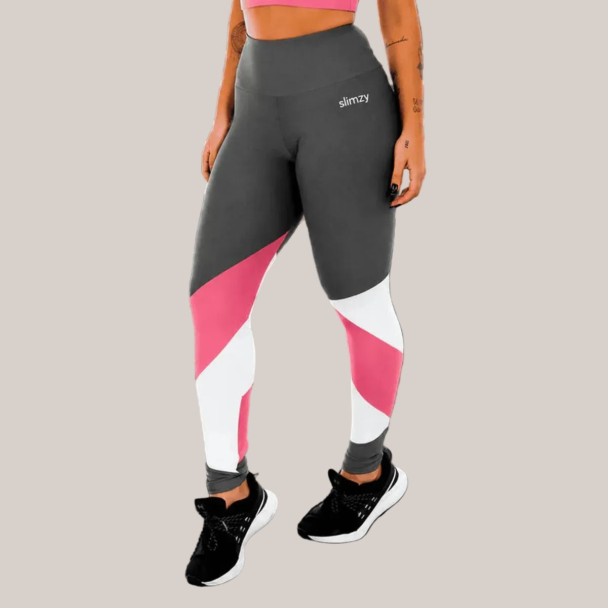 Slimzy women's geometric tricolor leggings in pink, gray, and white with a slim fit and stylish pattern.