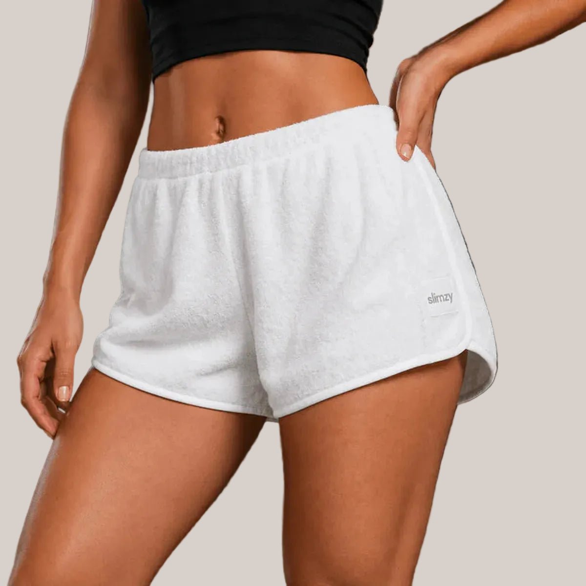 White Slimzy women's plush terry cloth loose fit shorts, comfortable and casual for relaxed wear.