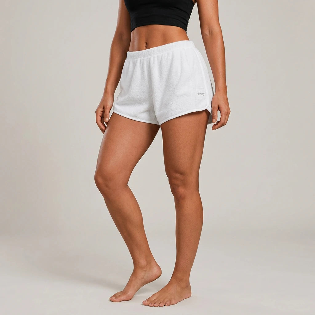 White Slimzy women's plush terry cloth loose-fit shorts, casual activewear with a comfortable, relaxed fit.