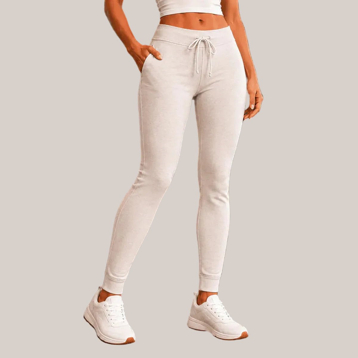Slimzy women's cozy off-white flare sweatpants with drawstring waist and relaxed fit, suitable for casual wear.