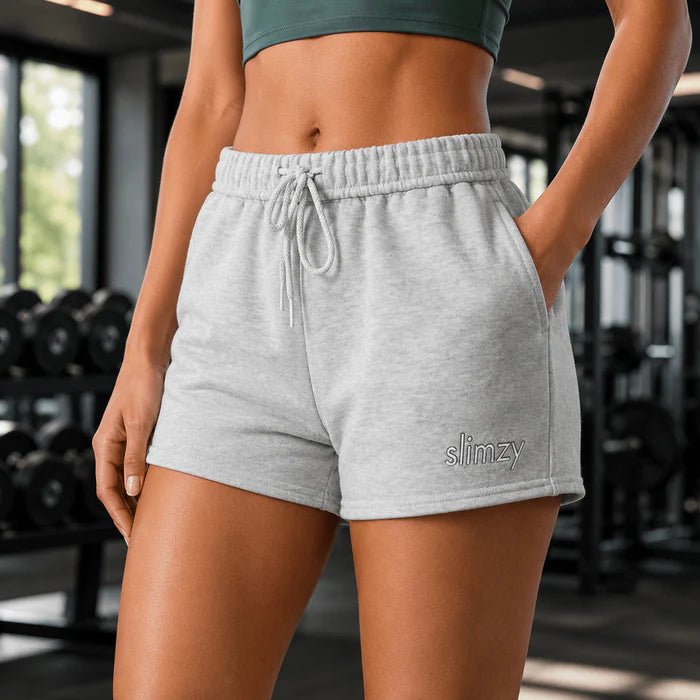 Gray Slimzy Women's cozy fleece drawstring shorts shown on a model, highlighting comfortable fit and casual style.